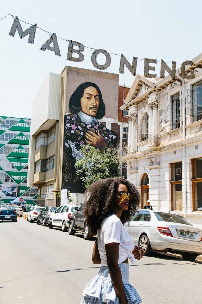 A stylish traveler exploring Maboneng in Johannesburg